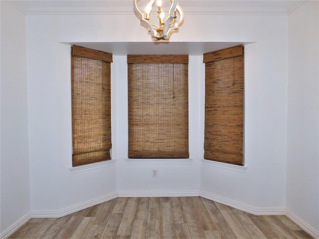 2001 Oak Tree Drive Denton, TX 76209 - Photo 11 of 34 an empty room with windows