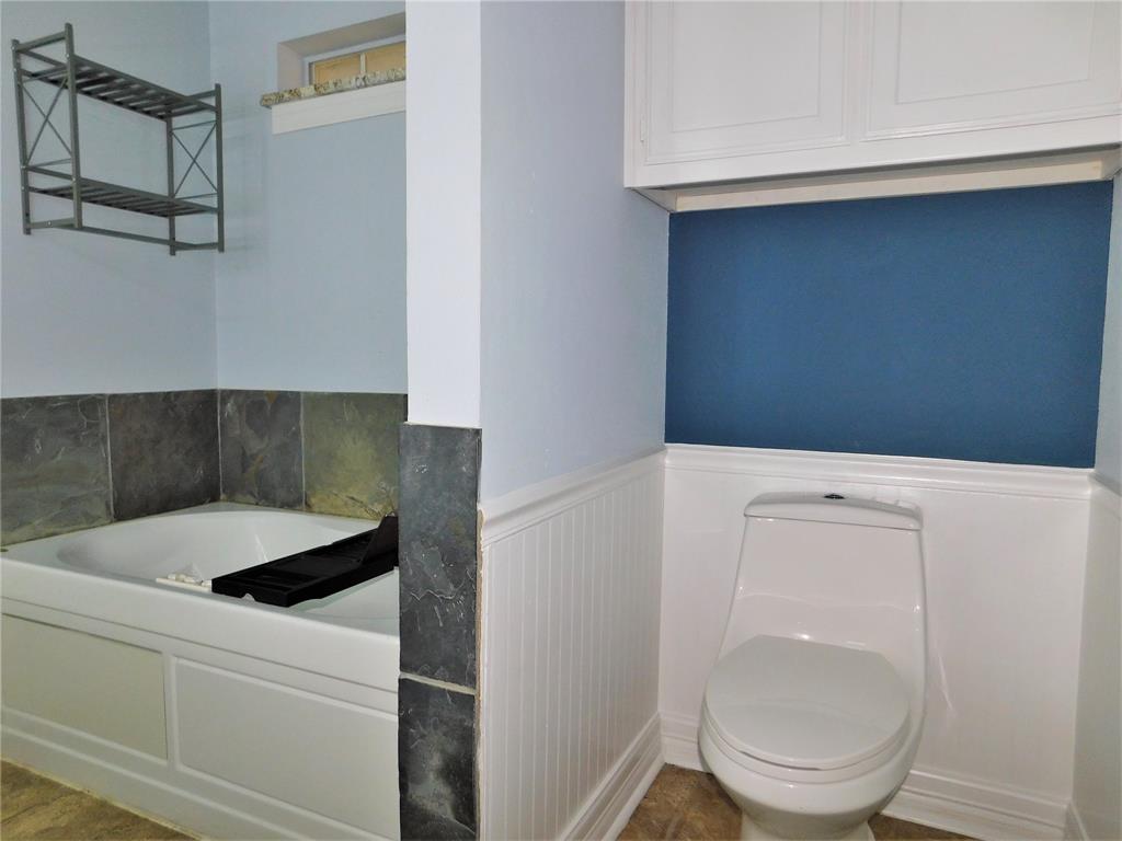 2001 Oak Tree Drive Denton, TX 76209 - Photo 17 of 34 a utility room with dryer and washer