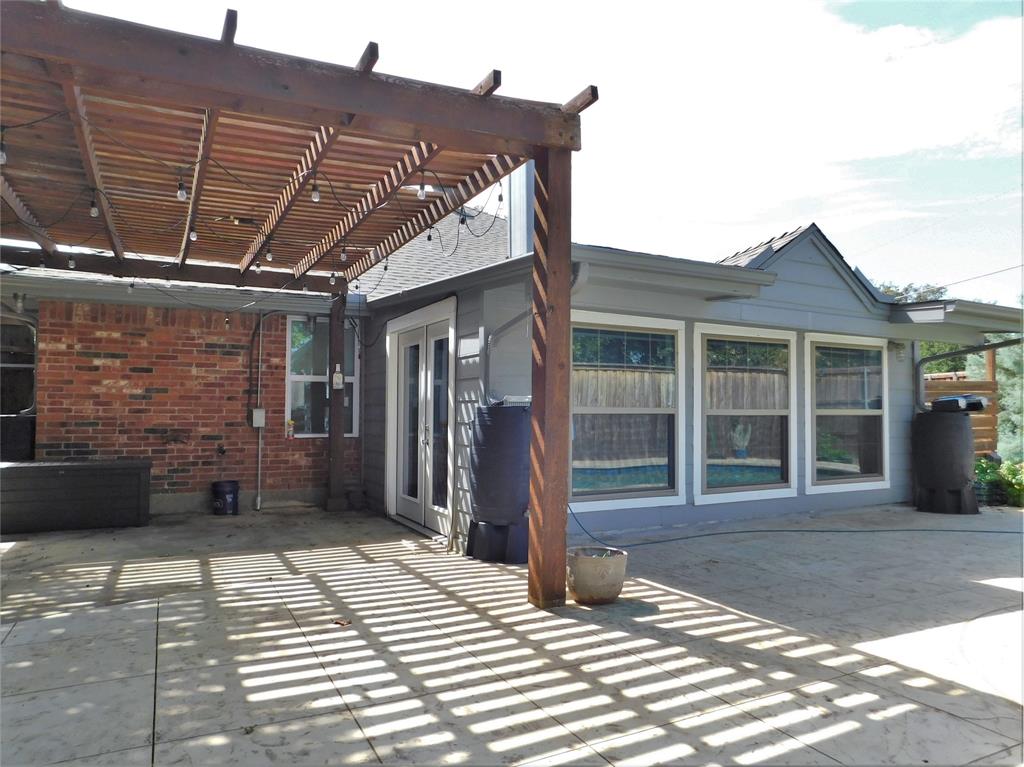 2001 Oak Tree Drive Denton, TX 76209 - Photo 29 of 34 a view of a house with a patio