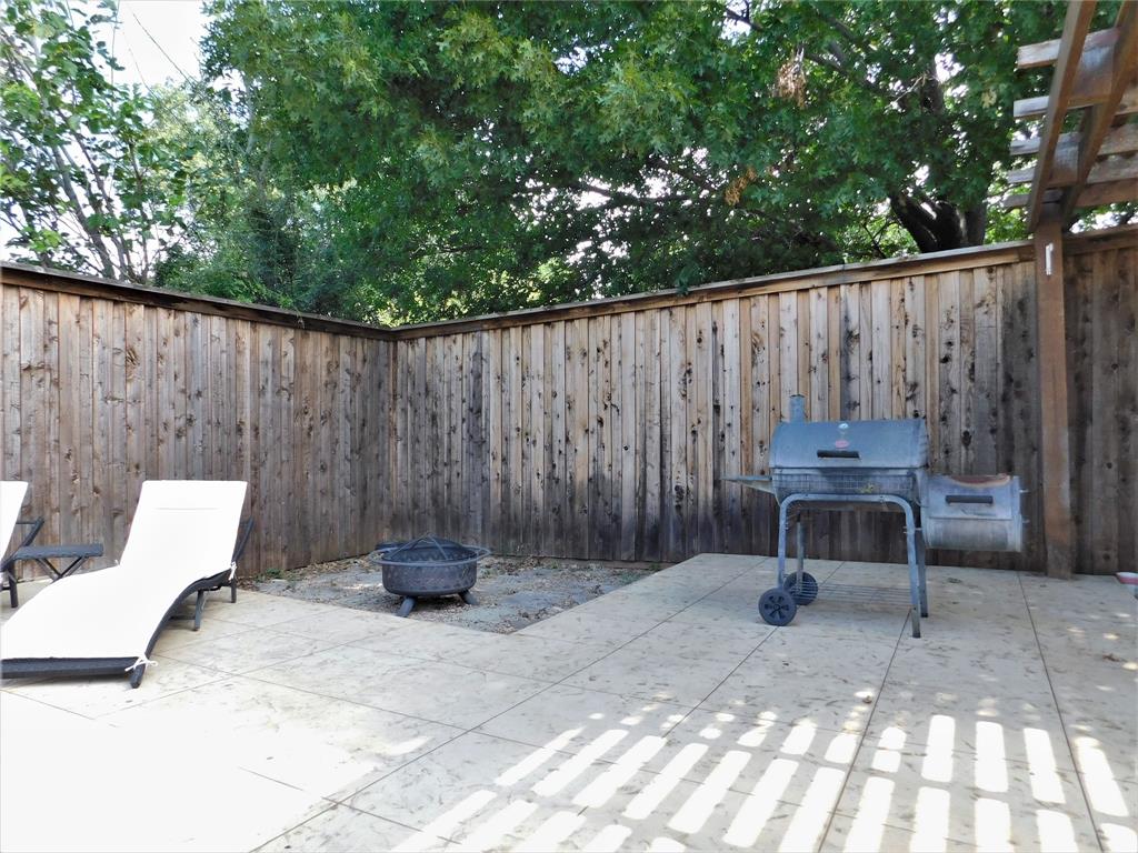 2001 Oak Tree Drive Denton, TX 76209 - Photo 30 of 34 a backyard view with a seating space