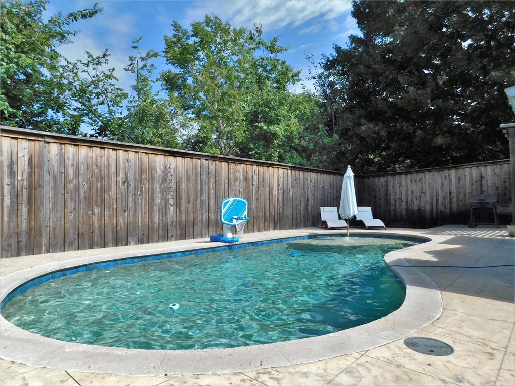 2001 Oak Tree Drive Denton, TX 76209 - Photo 33 of 34 a view of a wooden fence