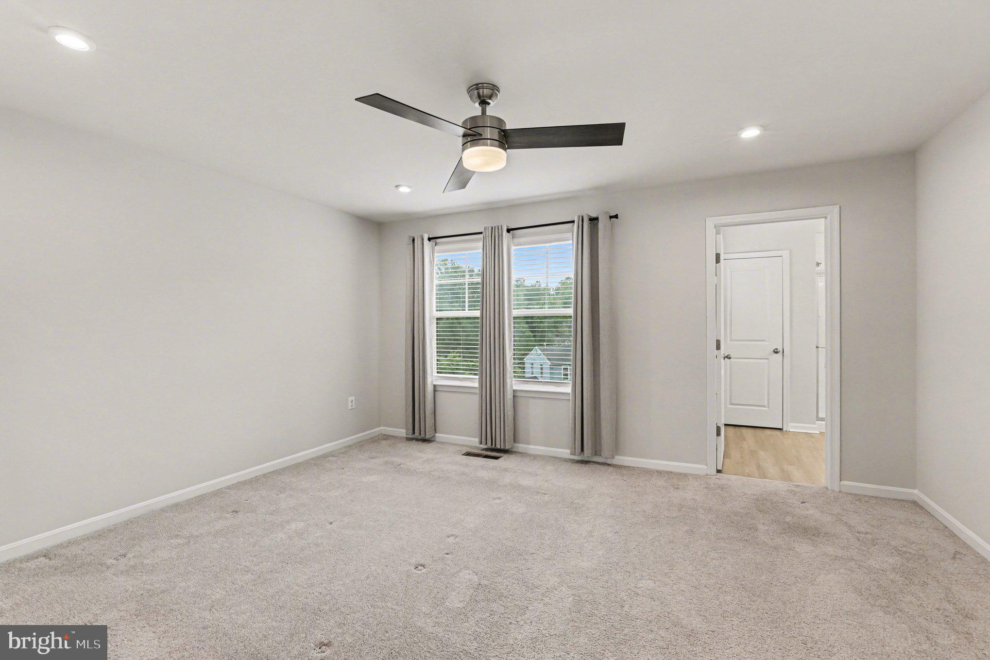 18281 Summit Pointe Drive Triangle, VA 22172 - Photo 11 of 30 a view of an empty room with a window