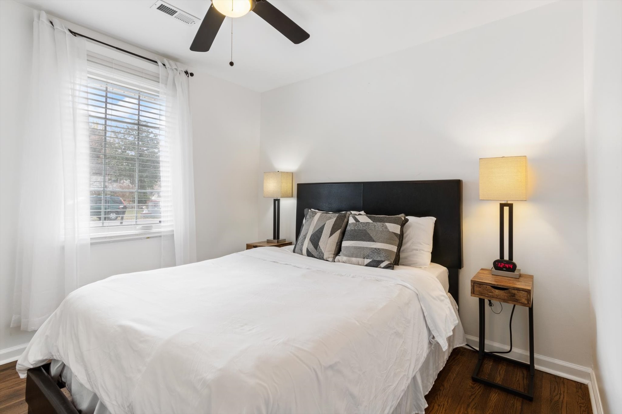 828 Irma Drive Antioch, TN 37013 - Photo 11 of 23 a large bed sitting in a bedroom next to a lamp