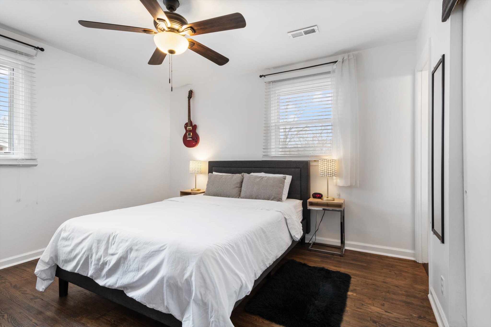 828 Irma Drive Antioch, TN 37013 - Photo 14 of 23 a bedroom with a bed and a chandelier