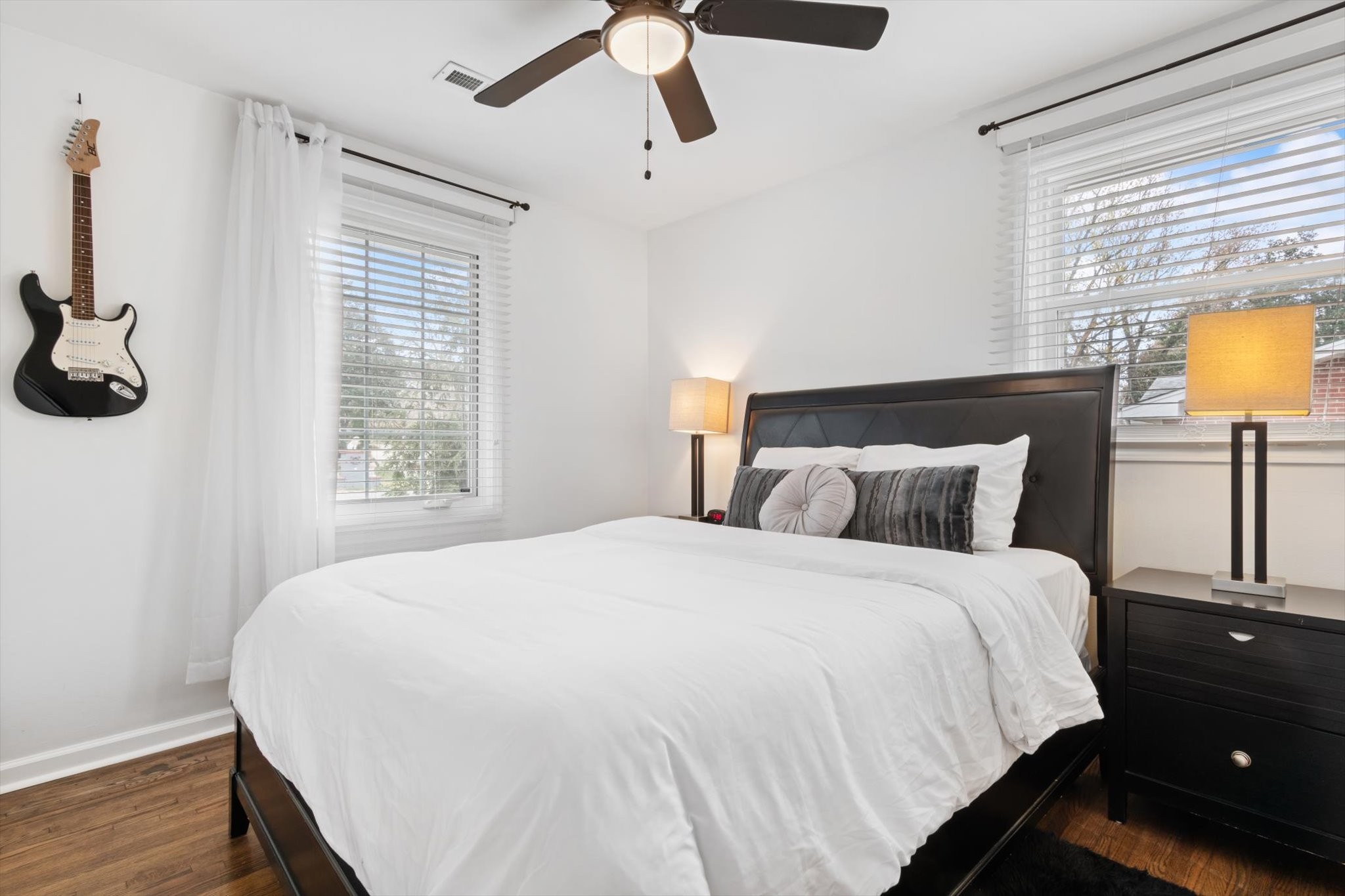 828 Irma Drive Antioch, TN 37013 - Photo 16 of 23 a large bed sitting in a bedroom next to a window