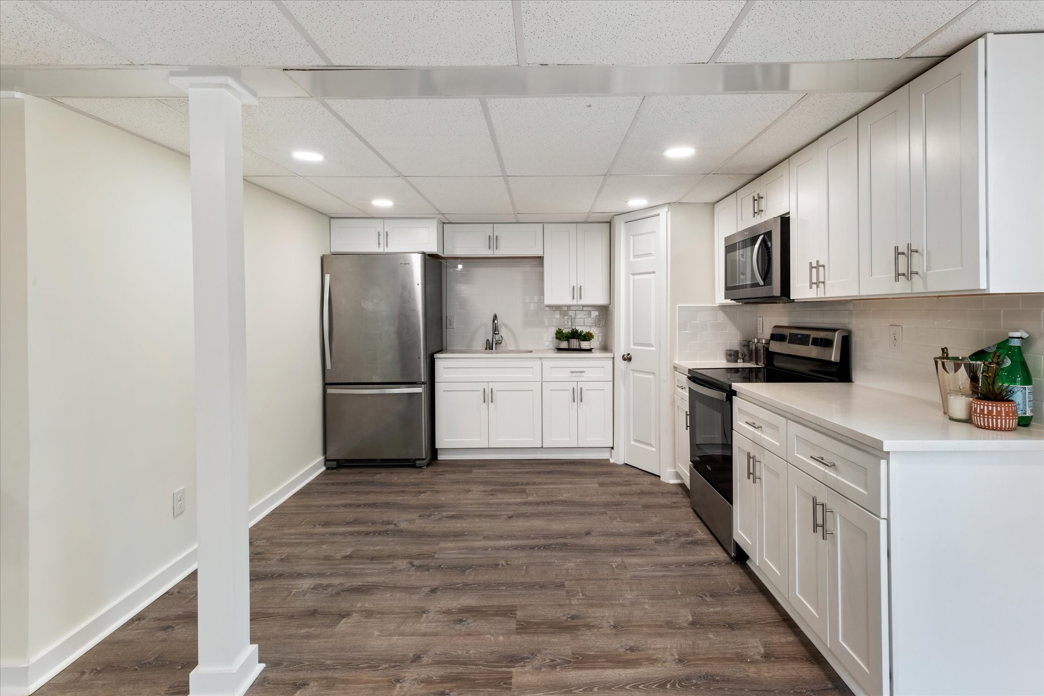 828 Irma Drive Antioch, TN 37013 - Photo 21 of 23 a kitchen with stainless steel appliances a refrigerator sink and cabinets