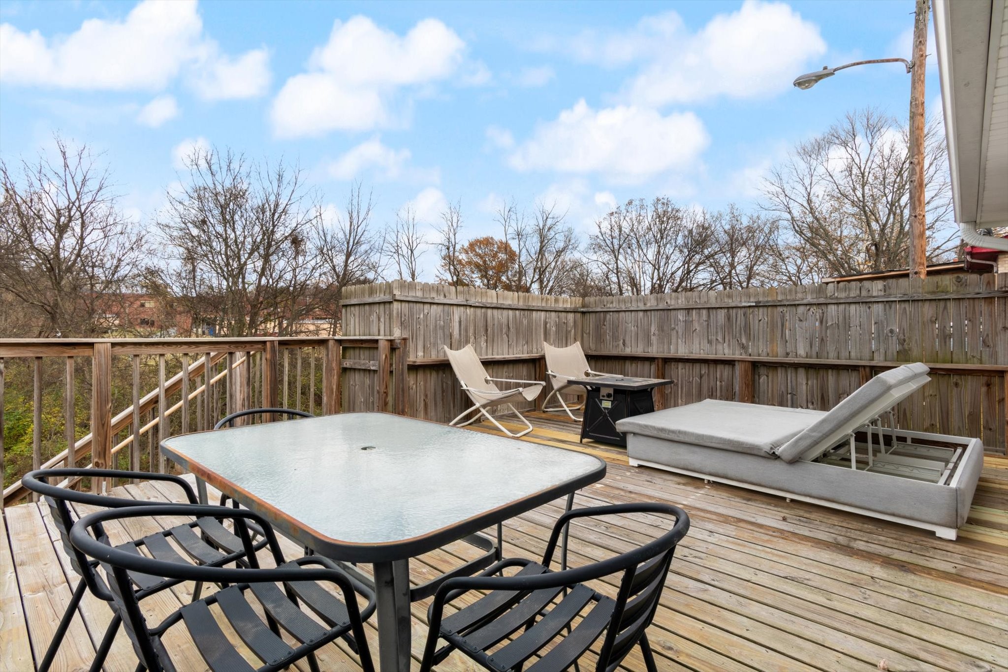 828 Irma Drive Antioch, TN 37013 - Photo 8 of 23 a view of a balcony with two chairs and a table