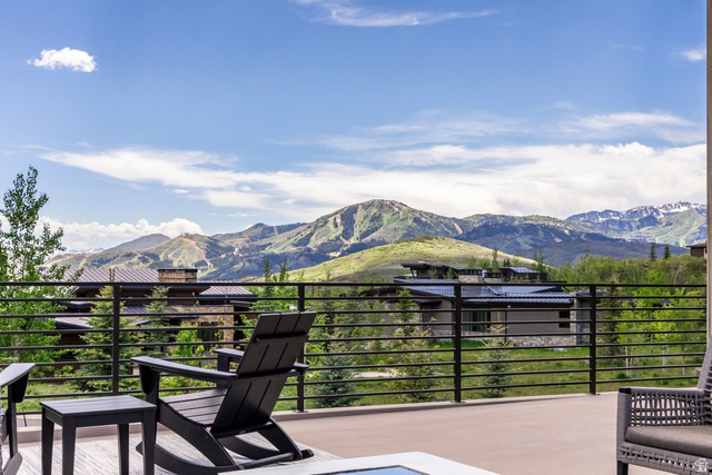 140 West Vista Road Kamas, UT 84036 - Photo 38 of 101 Spacious outdoor patio with mountain scenery, surrounded by mature trees