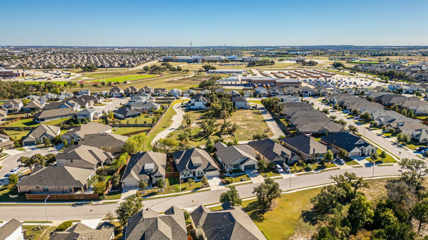 1301 Low Branch Lane, Unit 3 Leander, TX 78641 - Photo 21 of 38 an aerial view of residential building and parking space