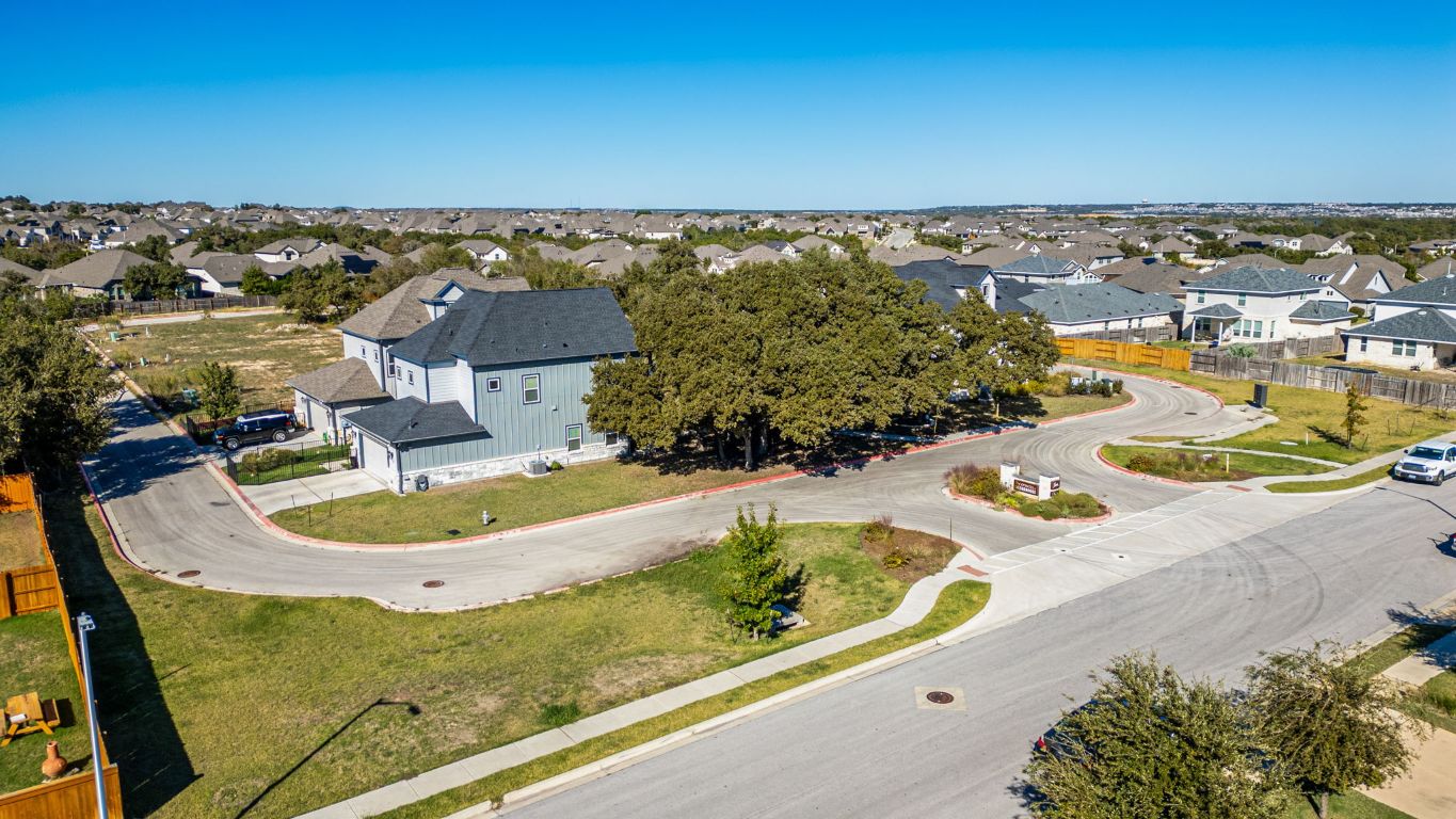 1301 Low Branch Lane, Unit 3 Leander, TX 78641 - Photo 7 of 38 an aerial view of a house with a swimming pool