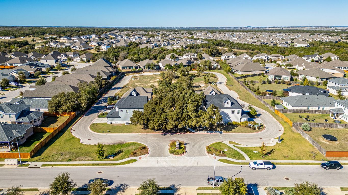 1301 Low Branch Lane, Unit 3 Leander, TX 78641 - Photo 10 of 38 an aerial view of residential houses with outdoor space
