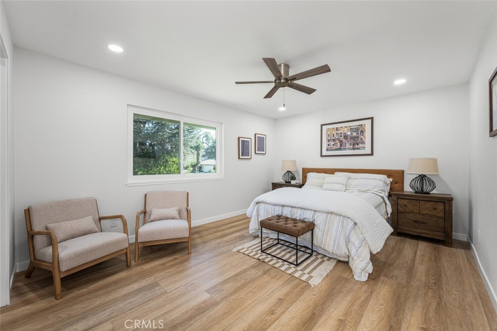 11344 Rochelle Street Los Alamitos, CA 90720 - Photo 19 of 55 a bedroom with a bed and a couch