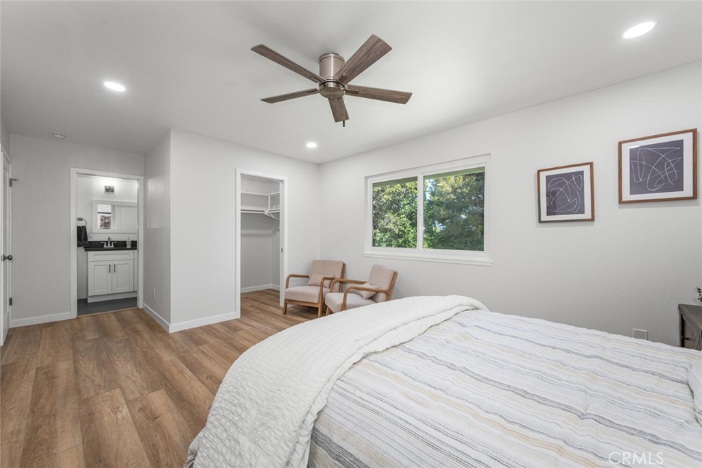 11344 Rochelle Street Los Alamitos, CA 90720 - Photo 21 of 55 a bedroom with a bed and a window