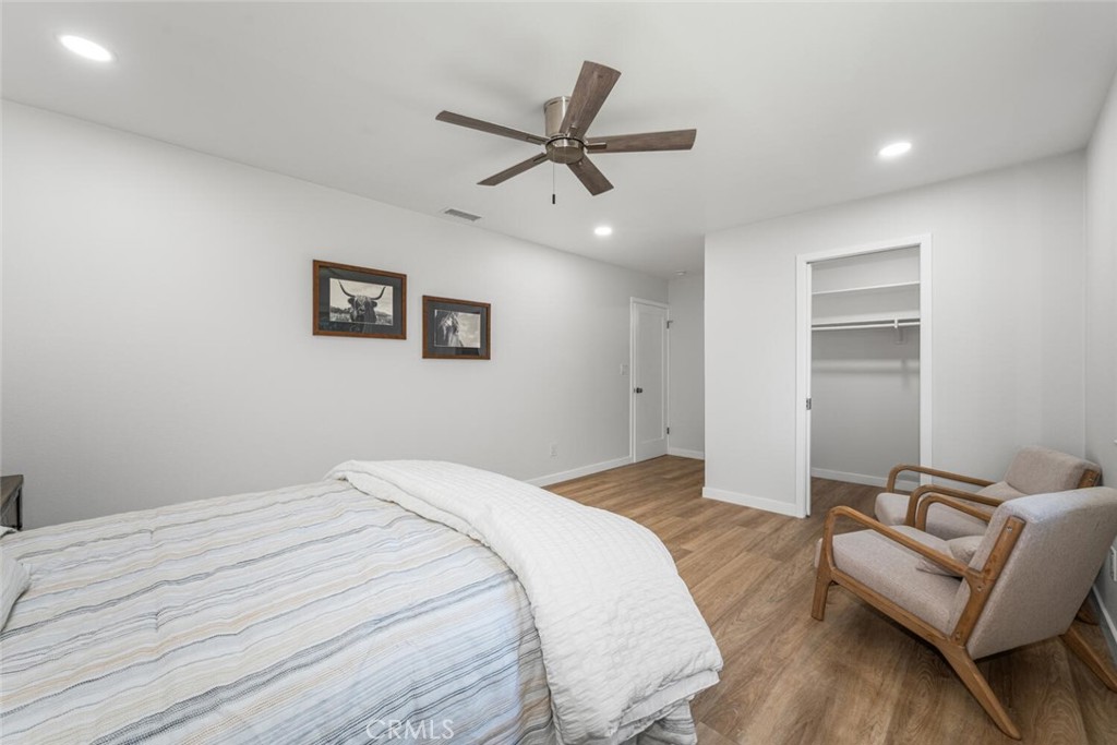 11344 Rochelle Street Los Alamitos, CA 90720 - Photo 22 of 55 a bedroom with a bed and a couch