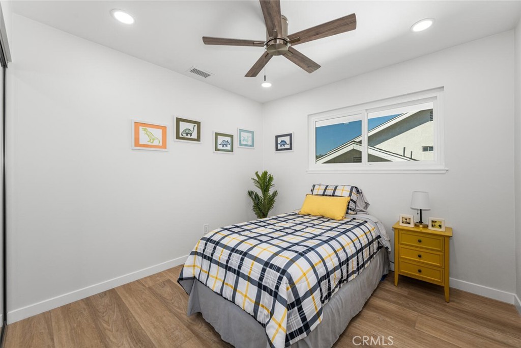 11344 Rochelle Street Los Alamitos, CA 90720 - Photo 37 of 55 a bedroom that has a bed and a tv on the wall