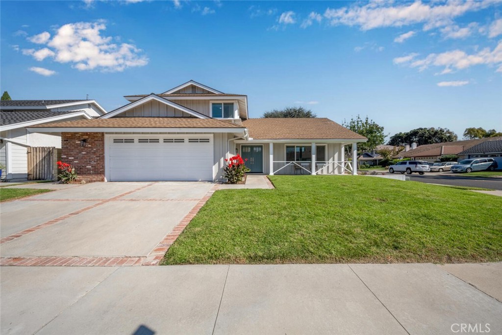 11344 Rochelle Street Los Alamitos, CA 90720 - Photo 47 of 55 a front view of a house with a yard