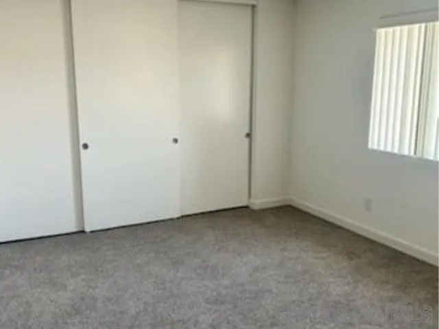 229-45 Shady Lane El Cajon, CA 92021 - Photo 59 of 65 an empty room with windows