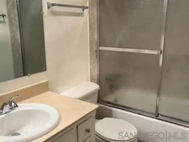 229-45 Shady Lane El Cajon, CA 92021 - Photo 62 of 65 a bathroom with a sink a toilet and shower