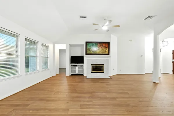 a view of an empty room with a window