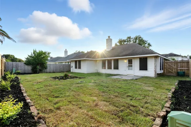 a house view with a garden space