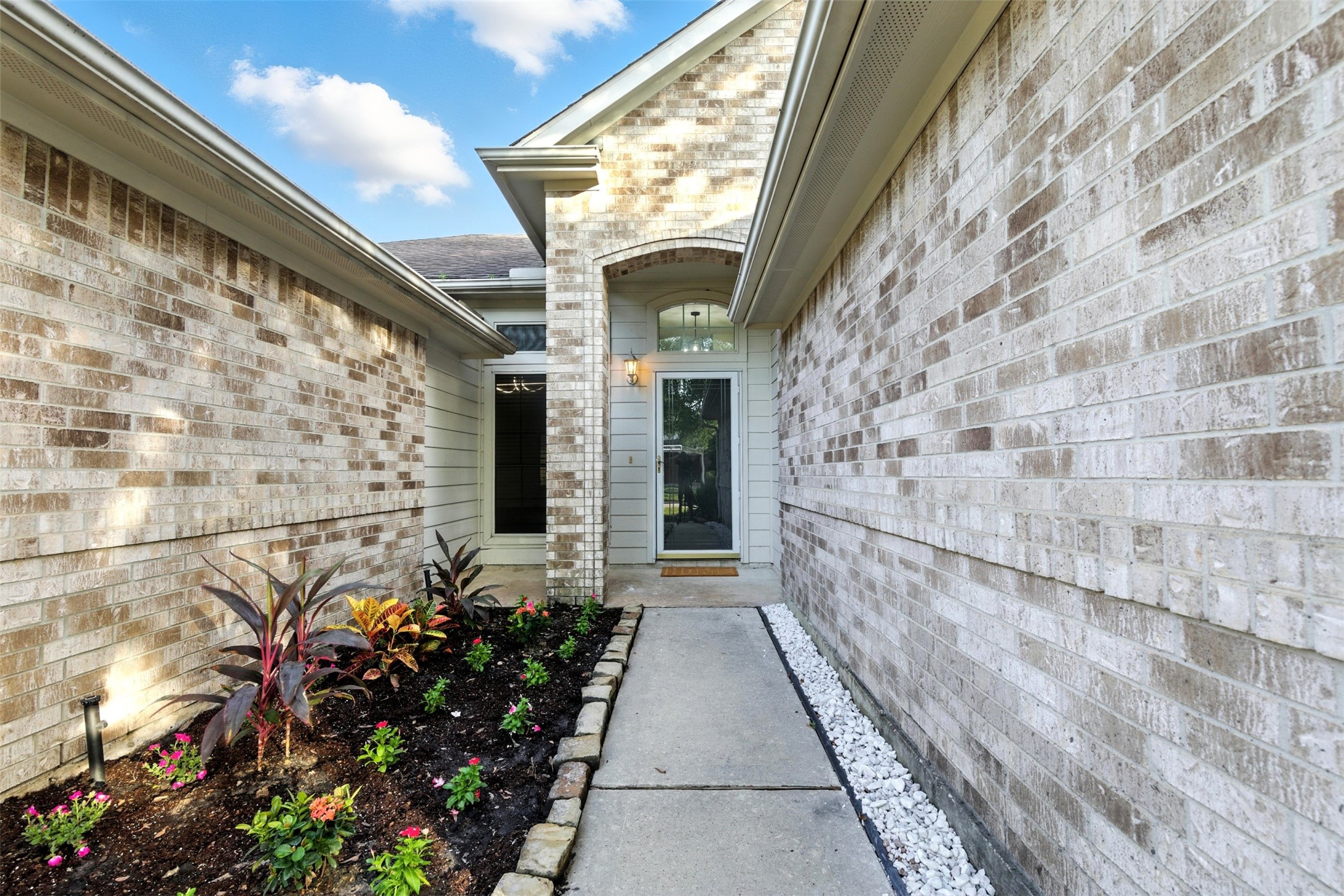 2119 Hannover Way Spring, TX 77388 - Photo 3 of 39 a view of a pathway with flower pots