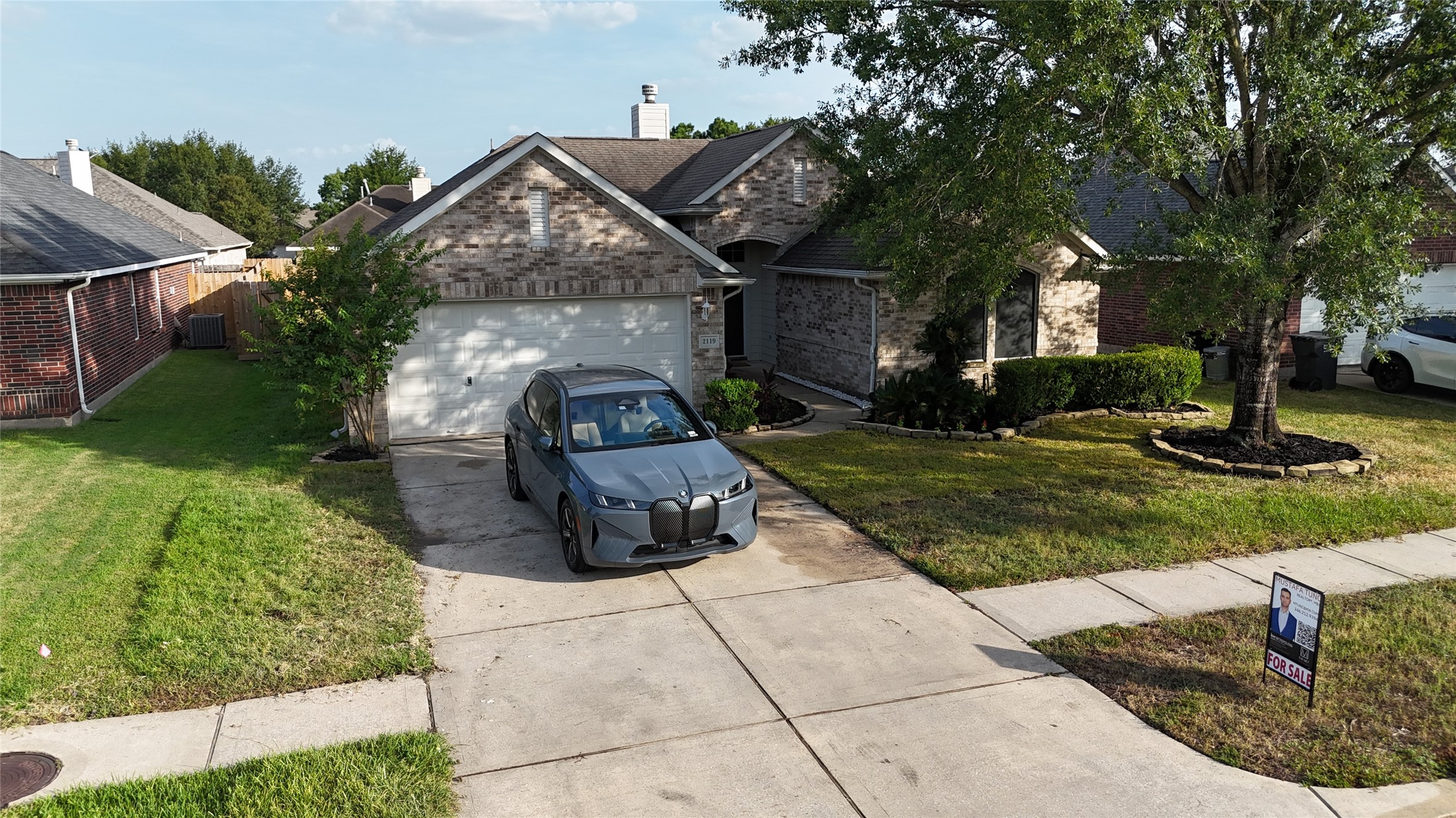 2119 Hannover Way Spring, TX 77388 - Photo 37 of 39 a front view of a house with garden