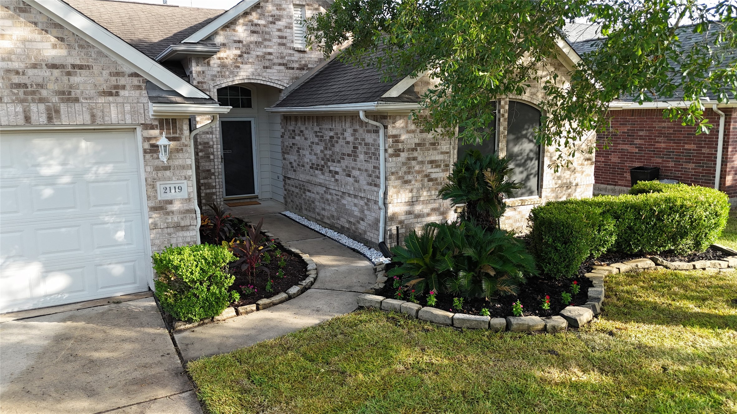 2119 Hannover Way Spring, TX 77388 - Photo 38 of 39 a view of a pathway of house with yard