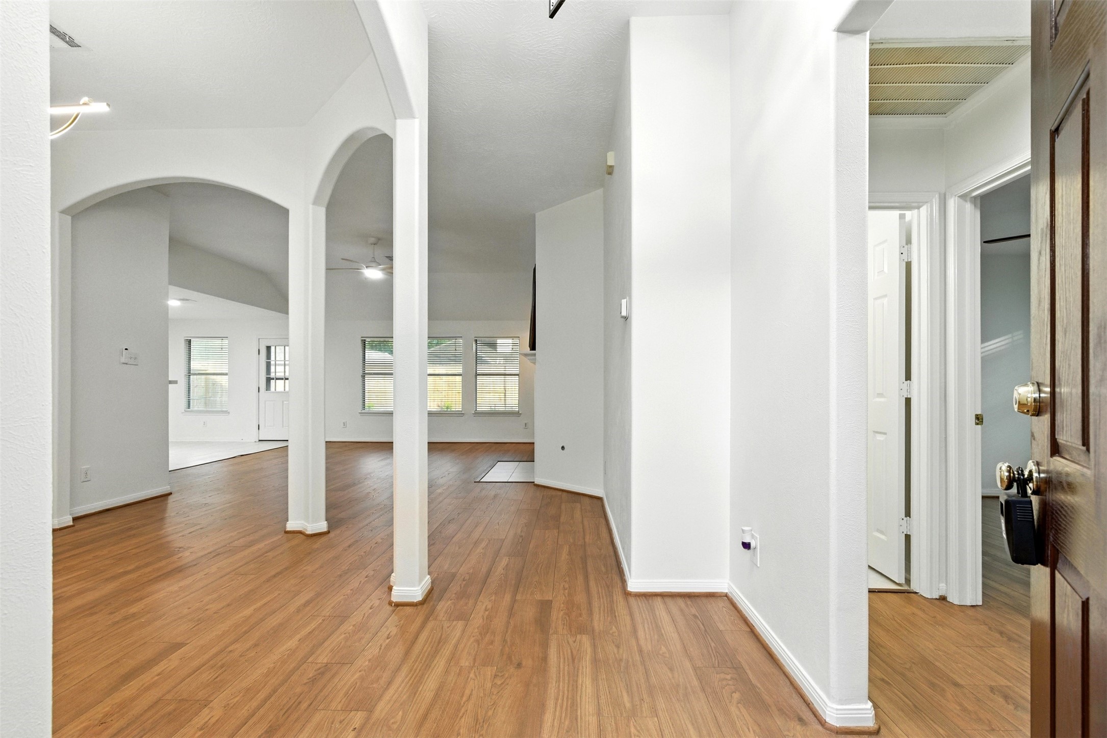 2119 Hannover Way Spring, TX 77388 - Photo 4 of 39 a view of empty room with wooden floor