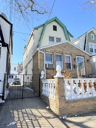 a front view of a house with balcony