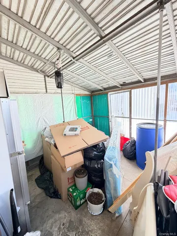 a view of a house with a snow in the yard