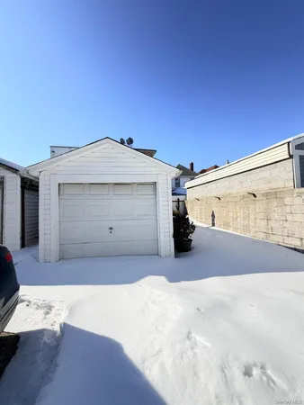 a view of a house with a street