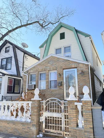 a front view of a house with parking