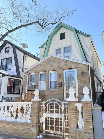 a front view of a house with parking