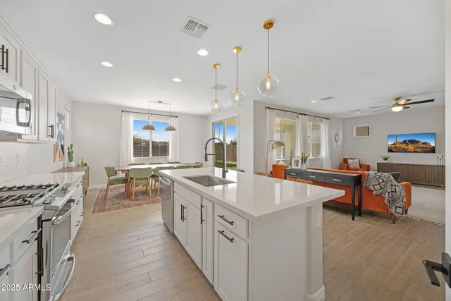 a dining room with furniture and window