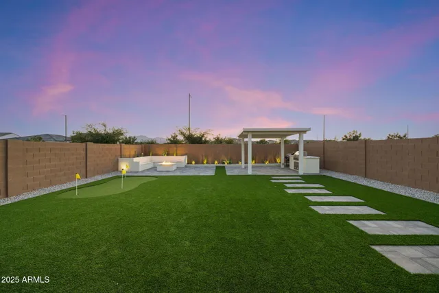 an aerial view of a house with a ocean view