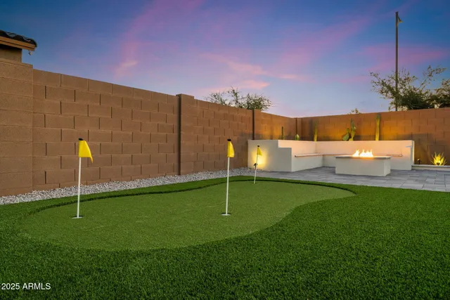 a view of a hallway with entryway wooden floor and front door