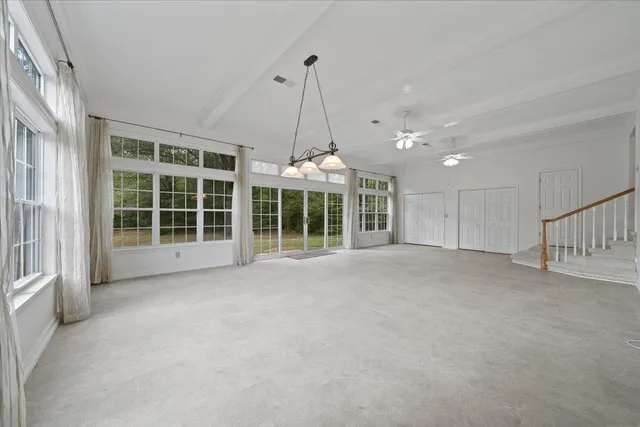 a bathroom with a sink a mirror and vanity