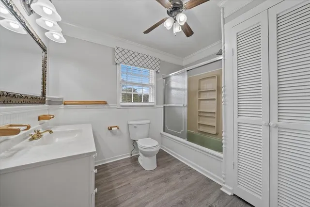 a view of a house with yard and tree s