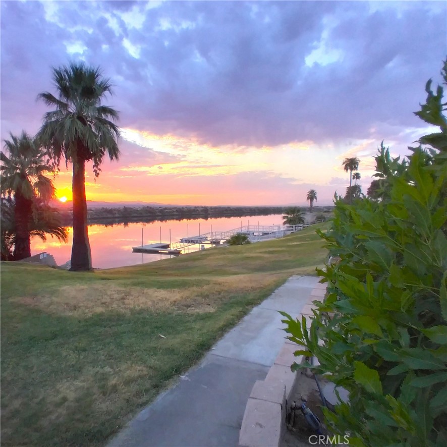 681 Channel Way Needles, CA 92363 - Photo 26 of 26 a view of a lake with a big yard