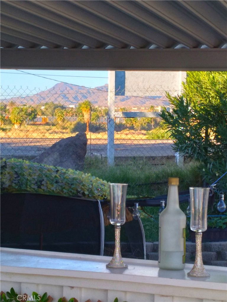 681 Channel Way Needles, CA 92363 - Photo 7 of 26 a view of a porch and garden