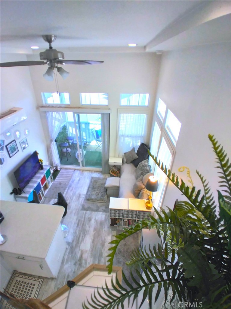 681 Channel Way Needles, CA 92363 - Photo 9 of 26 a living room with furniture and a chandelier