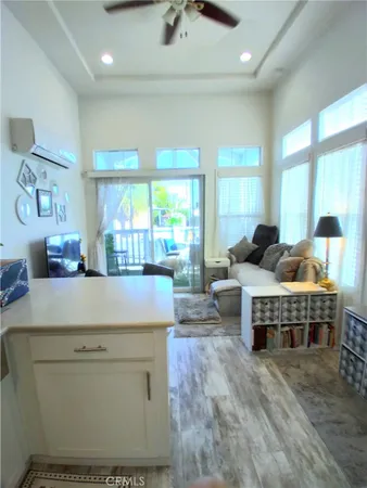 a kitchen with stainless steel appliances wooden cabinets and a stove top oven