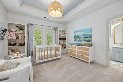 a bed room with furniture and a window