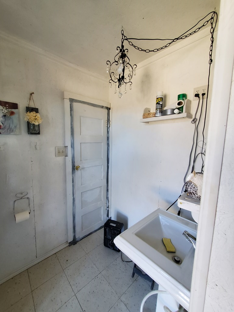 3567 Cave Wells Road, Unit 1721 Fort McKavett, TX 76841 - Photo 13 of 16 a bathroom with a sink and mirror