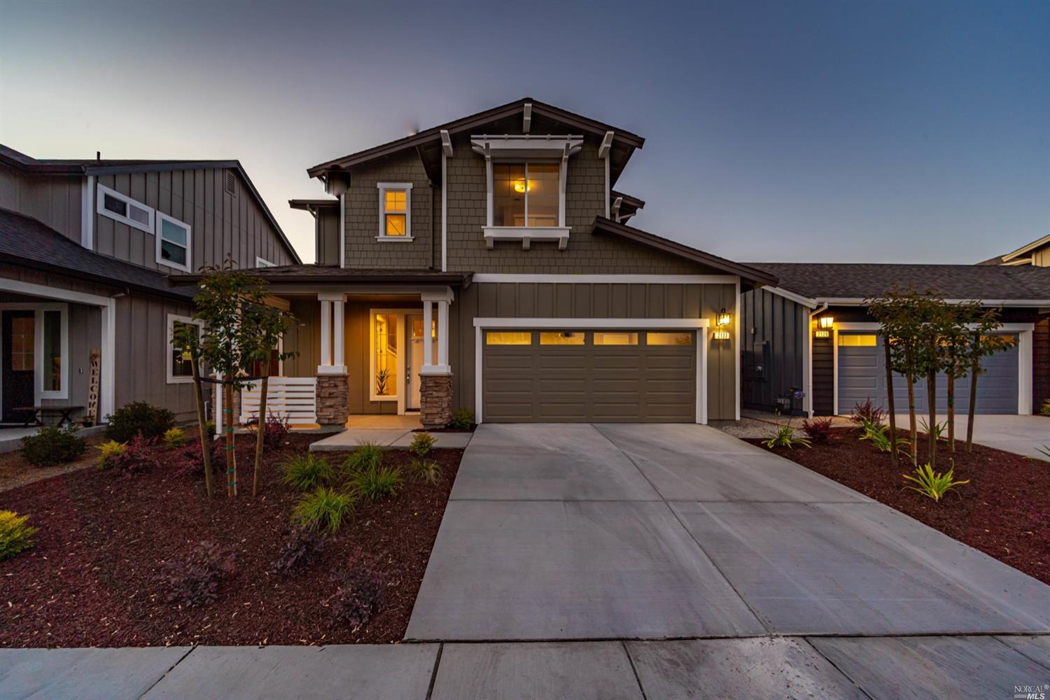 2113 Soleil Way Santa Rosa, CA 95403 - Photo 1 of 1 a front view of a house with garden