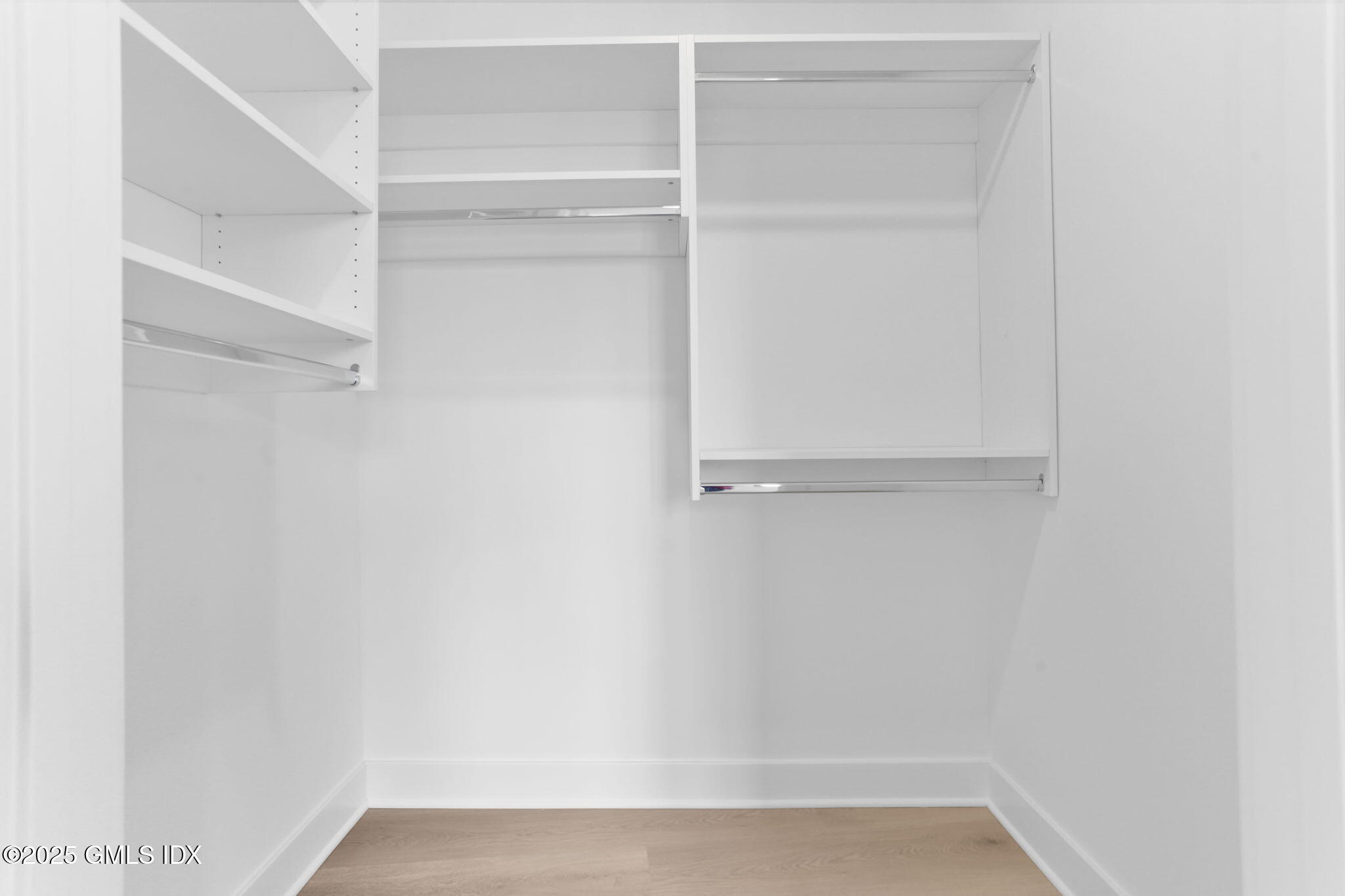 100 East Putnam Avenue, Unit 210 Cos Cob, CT 06807 - Photo 17 of 27 a view of an empty walk in closet