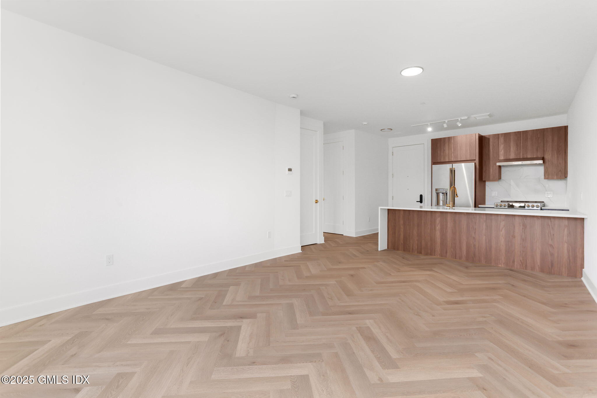 100 East Putnam Avenue, Unit 210 Cos Cob, CT 06807 - Photo 9 of 27 a view of kitchen and kitchen