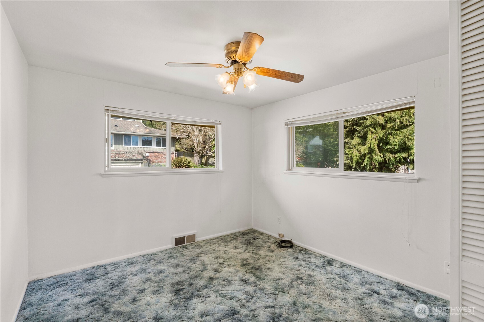 10702 39th Avenue Southwest Seattle, WA 98146 - Photo 16 of 40 a view of a hallway with a window
