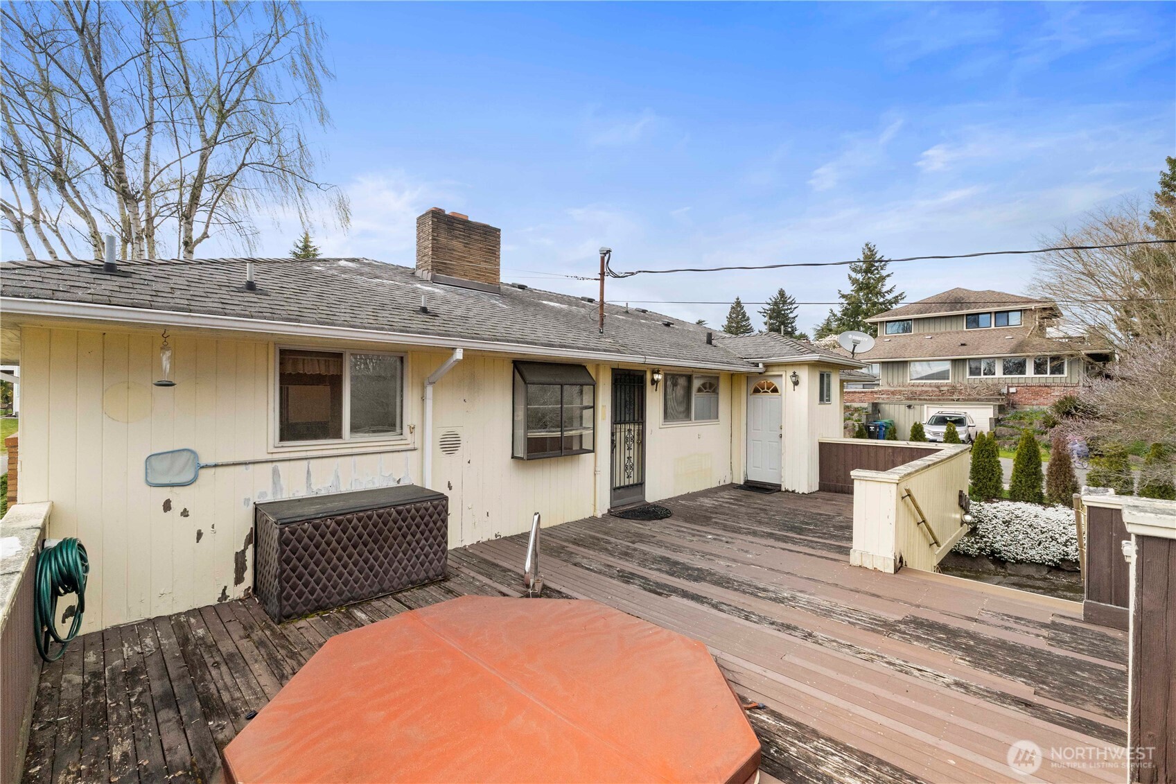 10702 39th Avenue Southwest Seattle, WA 98146 - Photo 30 of 40 a view of a house with backyard