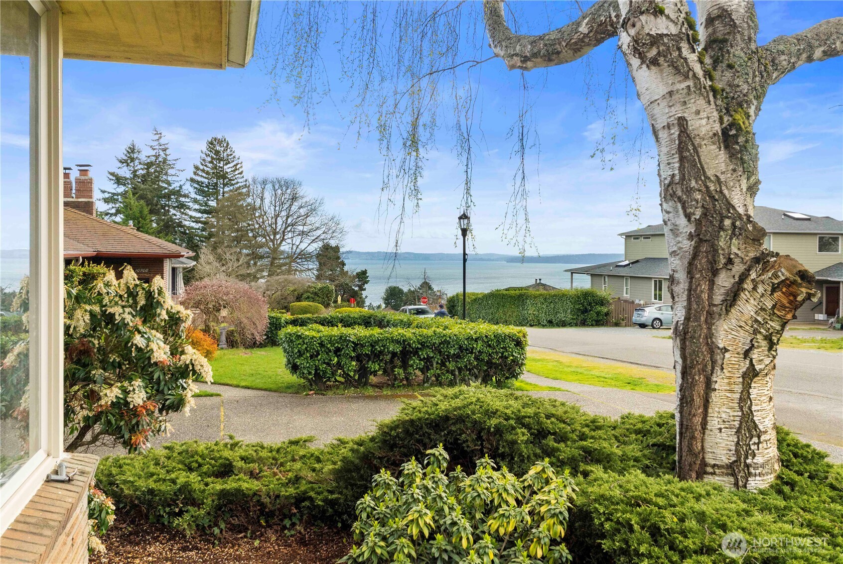 10702 39th Avenue Southwest Seattle, WA 98146 - Photo 3 of 40 a view of a backyard with swimming pool